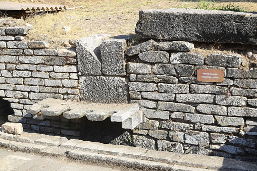 Salihli, Manisa, Turkey. 10 October 2021: Public toilets in historical ancient city Sardes (Sardis), Manisa, Turkey.