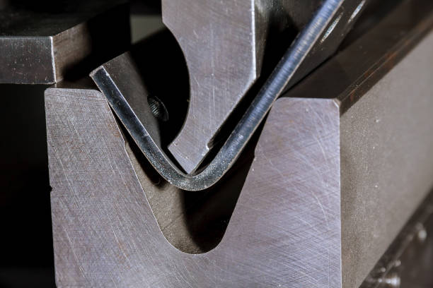 istock Sheet metal bending on a hydraulic press brake 1355381823