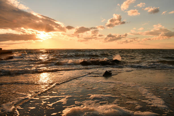istock Sunset at the sea 1355392834