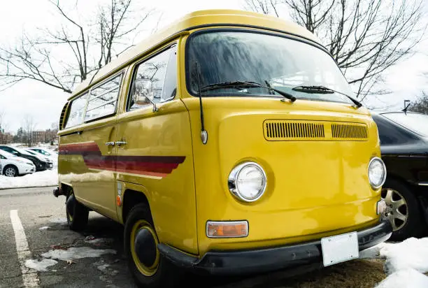Photo of Classic vintage yellow Volkswagen Transporter camper van parked in Portsmouth NH