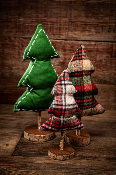 istock Christmas tree decorations on a retro wood background 1355400952