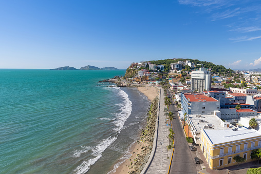 Panoramic view of scenic Mazatlan sea promenade and waterfront El Malecon with ocean lookouts, scenic landscapes and nearby islands.