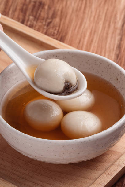 istock Sesame big tangyuan with syrup soup. 1355408517