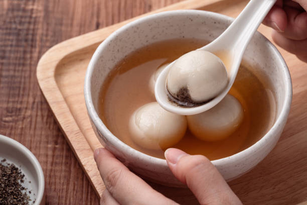 istock Sesame big tangyuan with syrup soup. 1355408716
