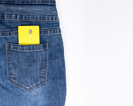 Bank credit card payment concept. Using bonus and accumulative cards. Jeans pocket.