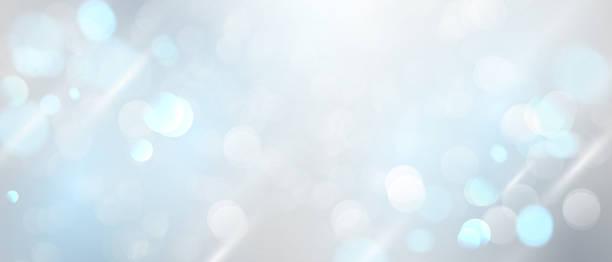 istock Blue glitter stars on abstract gray background are used for celebrations. 1355412242