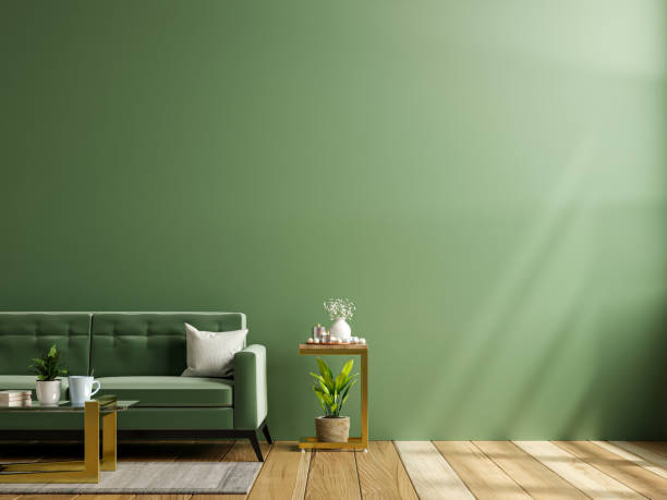 mock up della parete verde interna del soggiorno con divano in tessuto verde e pavimento in legno. - window cushion old built structure foto e immagini stock