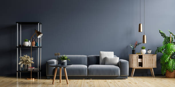 istock Mockup living room interior with sofa on empty dark blue wall background. 1355413798