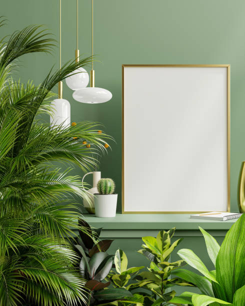 istock Mockup photo frame on the green shelf with beautiful plants. 1355413807