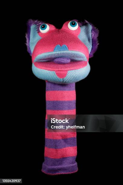 Sock Puppet Isolated Against Black Background Stock Photo - Download Image Now - Glove Puppet, Finger Puppet, Puppet Show