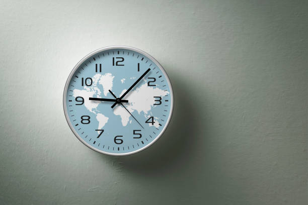 Earth Clock Earth Clock hanging on the wall. hour hand stock pictures, royalty-free photos & images