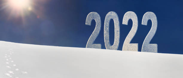 istock large figures 2022 on a snowy hill under the rays of bright sun 1355427991