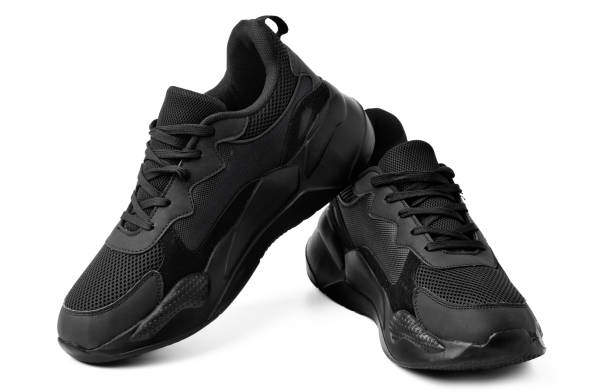 istock New black sneakers isolated on white background 1355433641