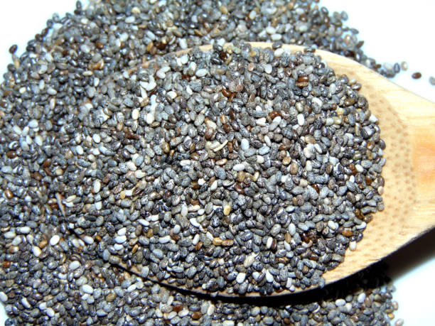 istock chia seeds on a wooden spoon 1355441743