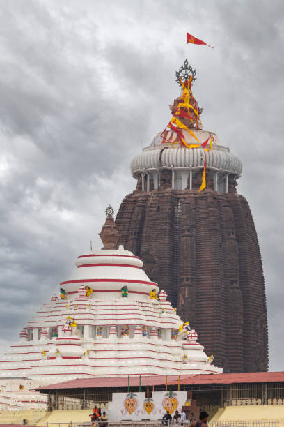 Main temple dome of Jagannath Temple, a famous Hindu temple dedicated to Jagannath or Lord Vishnu in the coastal town of Puri, Orissa, India. stock photo