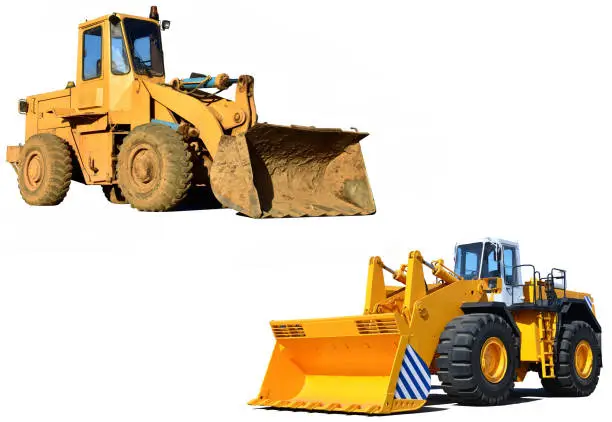 Front-end loader or all-wheel bulldozer isolated on white background. Heavy equipment machine and manufacturing equipment for open-pit mining. Two Wheel loader isolated.