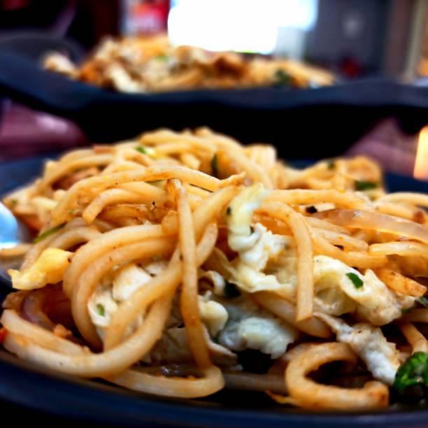 istock Delicious egg chicken noodles chowmein 1355445753