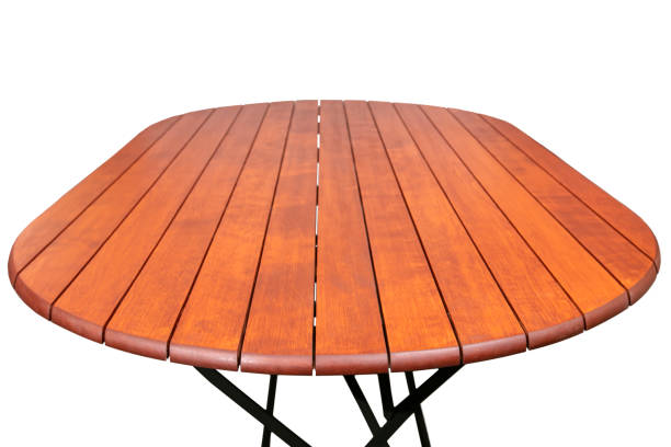 istock Round wooden table with metal legs on a white background. 1355449551