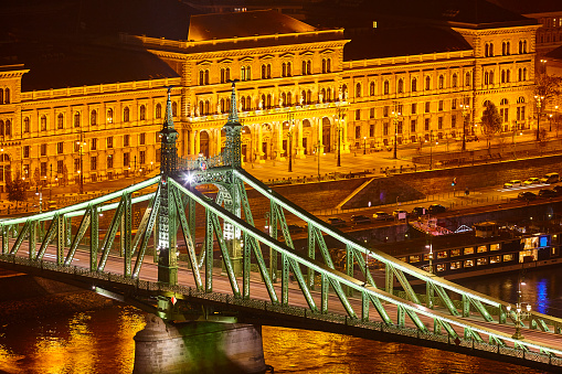 Liberty iron bridge. Danube river in Budapest. Corvinus University. Hungary