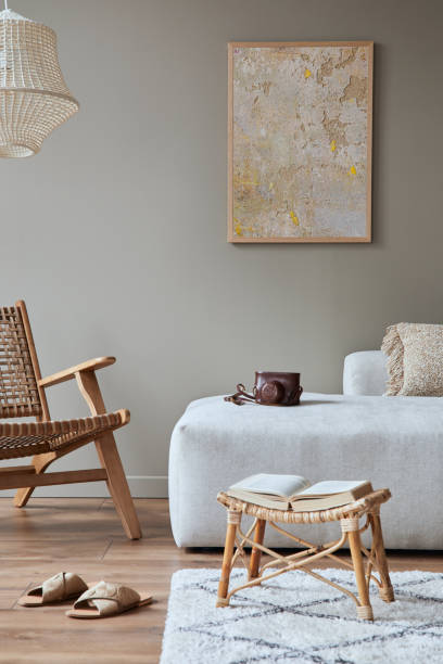 istock Stylish interior of living room with design neutral modular sofa, mock up poster frames, furniture and elegant personal accessories in modern home decor. Template. 1355451803
