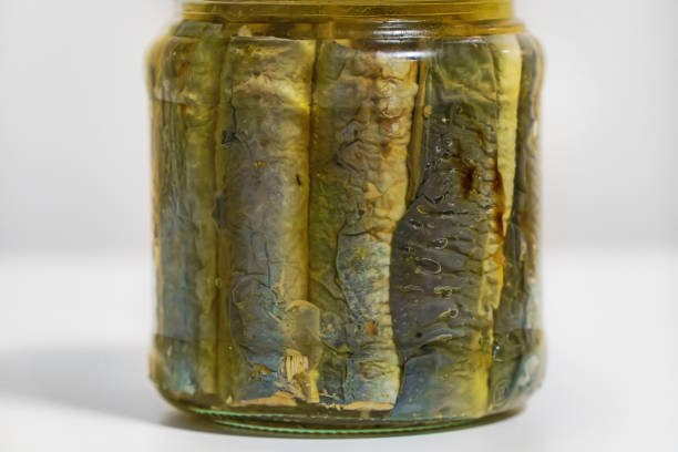istock Homemade canned fried lamprey fish with marinade. 1355452421