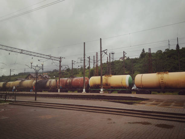 istock Train wagons road gloomy grunge 1355459543