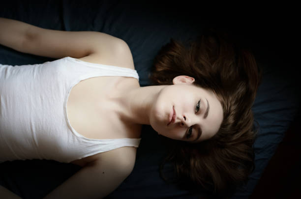 istock Young woman with blue eyes. 1355464038