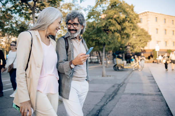 istock Mature couple on a journey walking and enjoying 1355468266