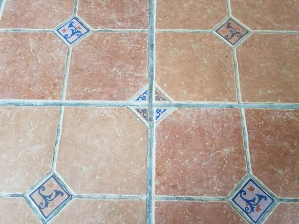 istock old brown and blue floor tiles on ground 1355469386