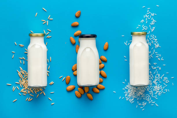 istock Set of non dairy substitute milk with almonds rice and oats 1355480239