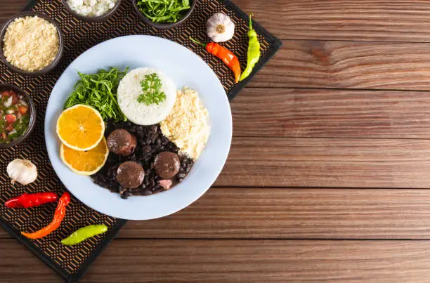 Feijoada typical Brazilian food. Traditional Brazilian food made with black beans. Top view. copy space.