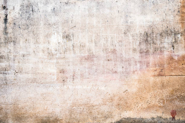 istock Empty Old Wall Texture. Painted Distressed Wall Surface. Grunge Stonewall Background. Shabby Building Facade With Damaged Plaster. Abstract Web Banner. Copy Space 1355483361