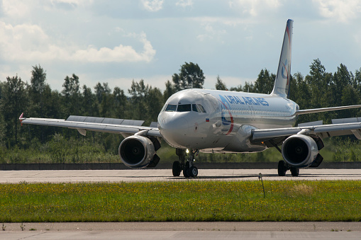 Saint Petersburg-Russia-28.09.2021: Ural Airlines plane at Pulkovo airport. Aviation industry infrastructure.