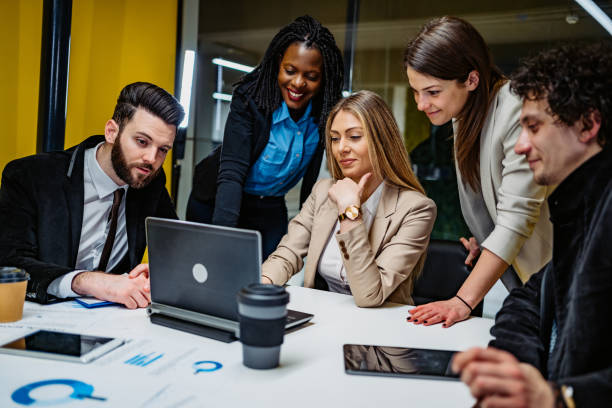 istock Young people at business meeting 1355495011