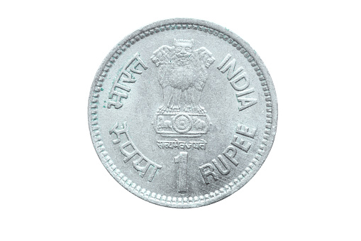 Indian one rupee silver coin with details.