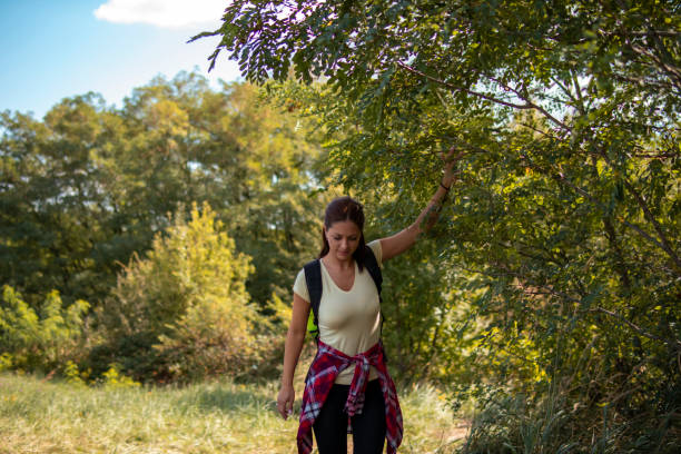 istock Beautiful woman hiking on pastures in the mountains 1355499708