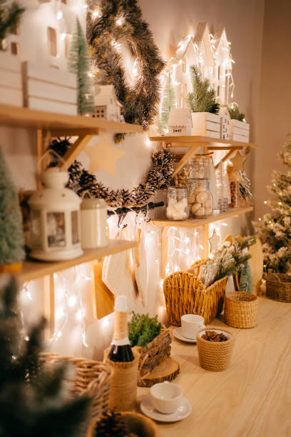istock side view. Christmas decor. garlands on decorated in kitchen for new year. 1355500363