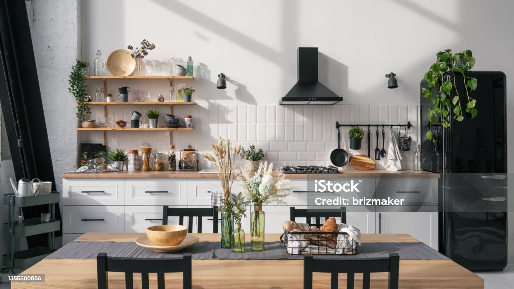 Modern Kitchen Interior Design With Table And Decor Stock Photo ...