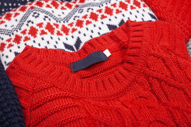 istock Collection of knitted sweaters close-up 1355501118