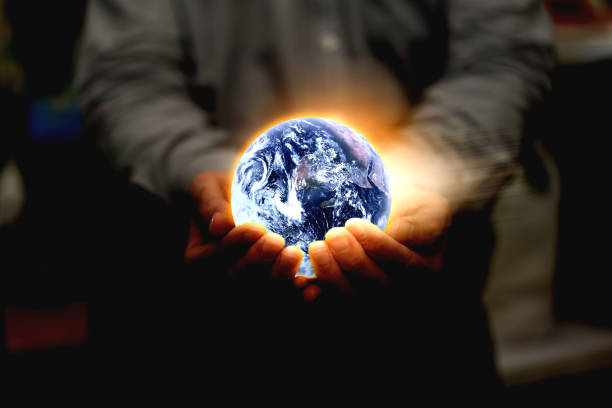 Hand hold world globe for eco environment protection and save blue planet from global warming with care business health care and technology