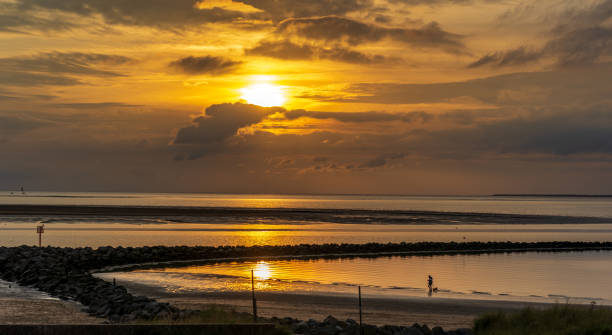 istock Sunset over Carmarthen Bay 1355505662