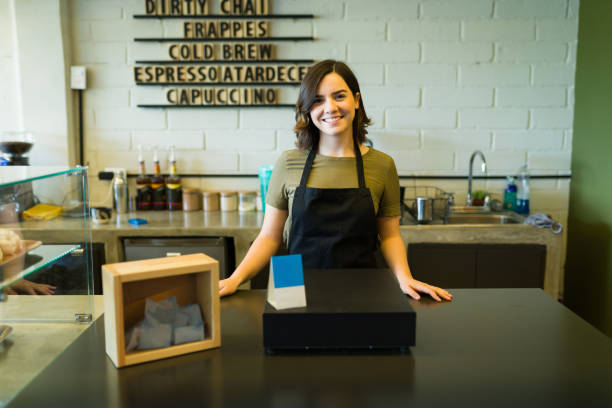 istock Beautiful woman waiting for customers 1355507076