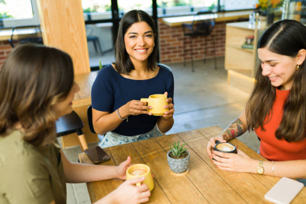 istock Multiracial women enjoying coffee 1355507155