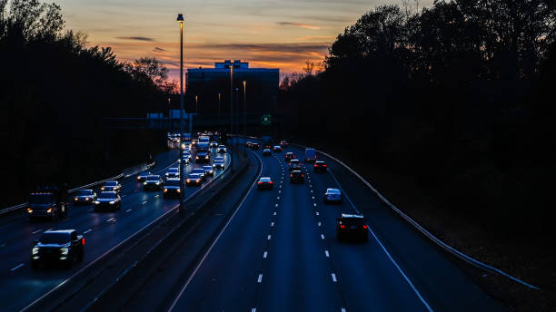 istock Sunset over busy  I-95 highway day before Thanksgiving Day 1355507169