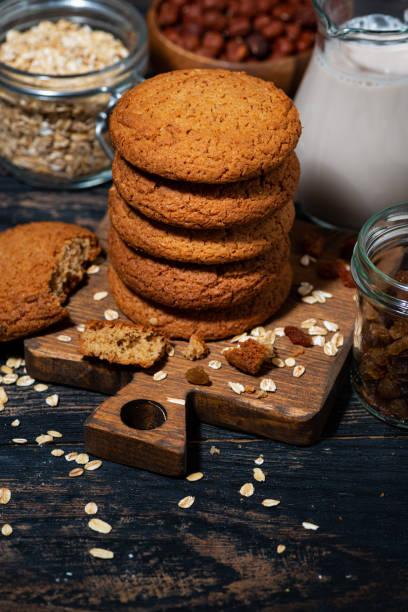 istock fresh sweet oatmeal cookies and baking products, vertical 1355507307