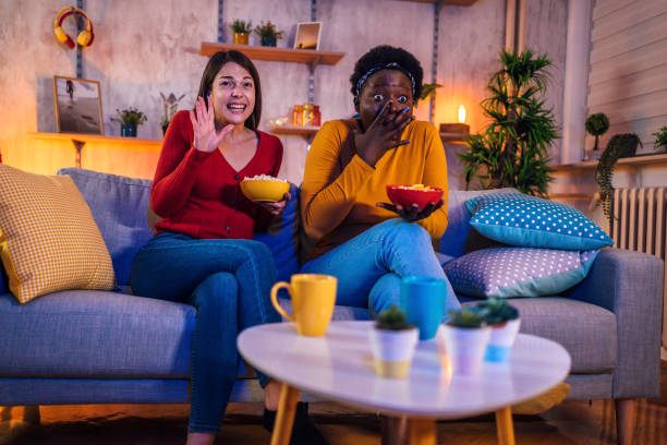 istock Best friend women watching TV 1355507987