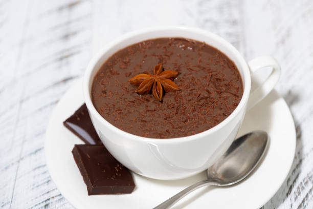 istock cup of hot spiced chocolate on white table 1355508049