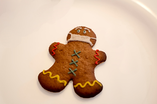 Christmas gingerbread man cookie on white background stock photo