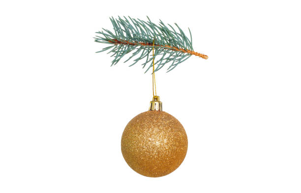 istock Golden Christmas ball hanging from a Christmas tree twig 1355512692