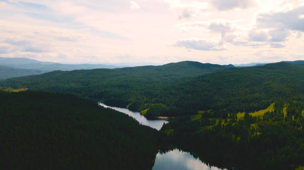 istock View on the lake between rocky mountains. Beautiful landscape 1355513610